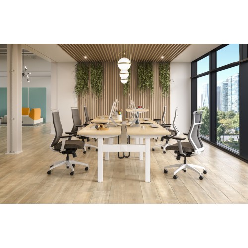 Hexi is a work chair with a black base and orange upholstery, on wheels.-9